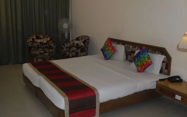 OYO Premium Sector 26 Madhya Marg