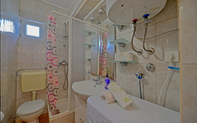 Apartment Puli - 200m from sea: Nela2  Postira, Island Brac