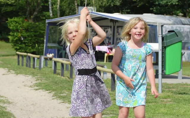 Nice house with a garden, surrounded by forest