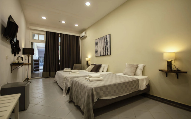 Olive Grove Beachfront Apartments & Suites