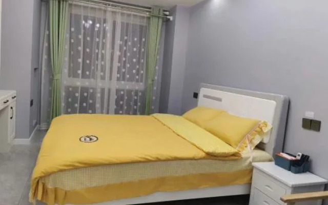 Xiongda Boutique Apartment (Fuyang Wanda Plaza)