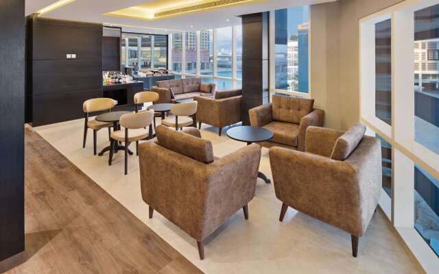 Отель Radisson Blu Hotel, Dubai Canal View