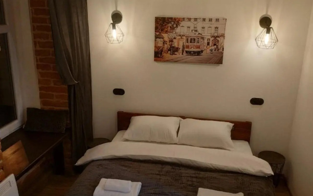 Loft апартаменти з балконом в центрі Львова