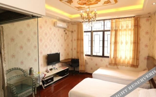 Yibin Qihang Hotel (Lizhuang Ancient Town)