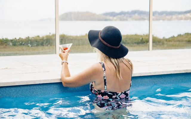 Seaside Sanctuary - Waterfront Luxury Home with Heated Pool