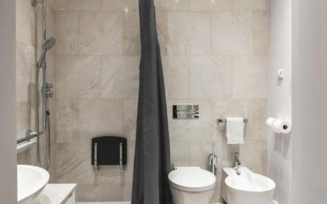 Design Central Studio Apartment with Balcony by Hostlovers