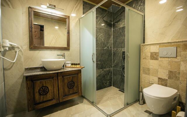 Ada Cave Suites Hotel