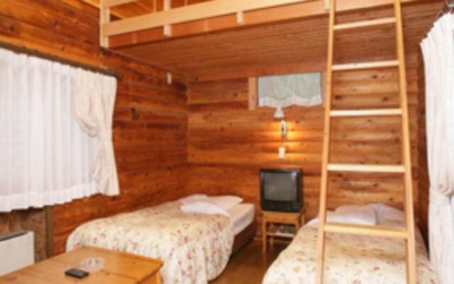 Cottage In Log Cabin