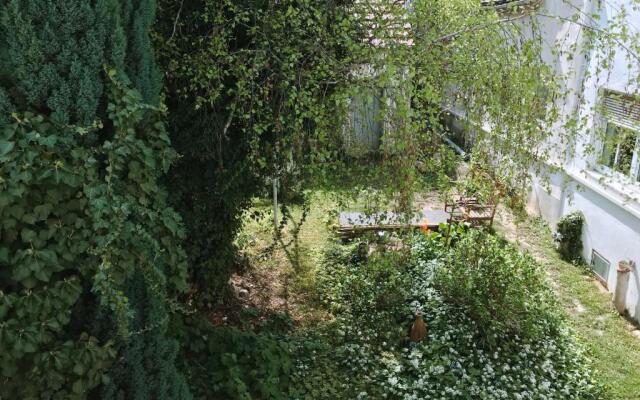 Ferienwohnung in der Fußgängerzone Gartenblick - Studio Apartment