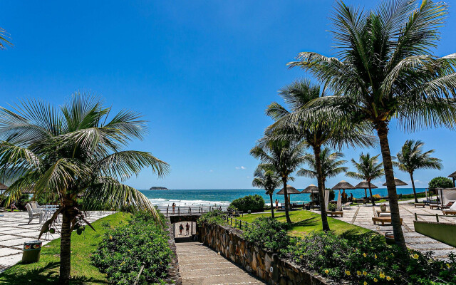 Studio vista mar pé na areia no Santinho STO2208