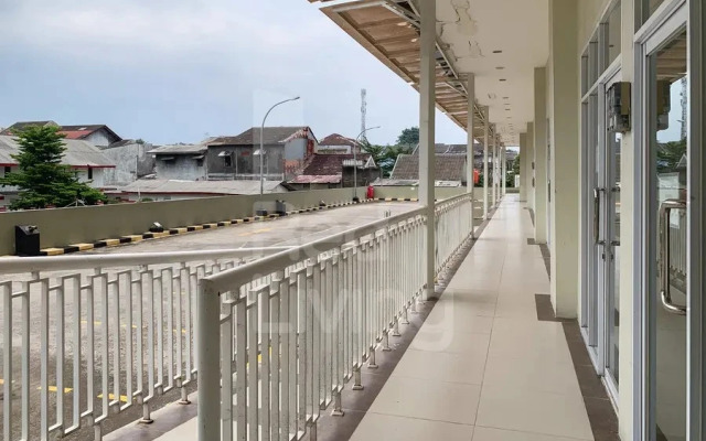 RedLiving Apartemen LoftVilles City - Pelangi Rooms