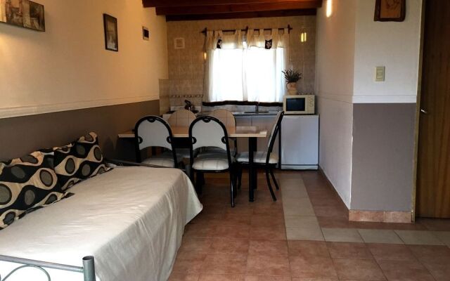 Apart Hotel el Jardin de los Presentes