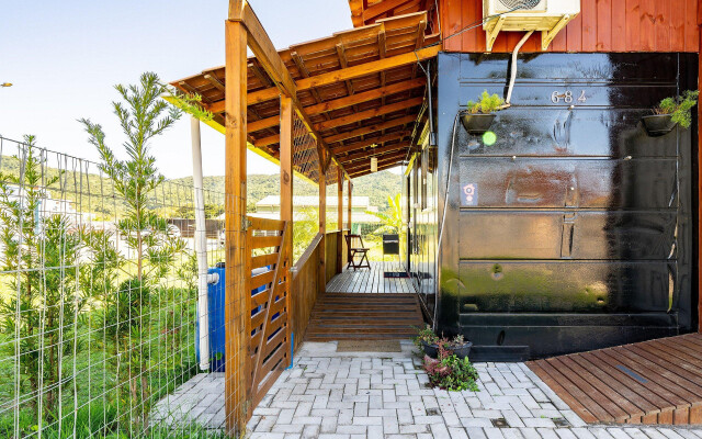 Charmoso flat a 8min da praia de Bombas RGA6841