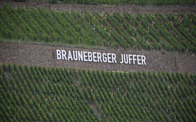 The Old Gemeinde House by the Mosel River