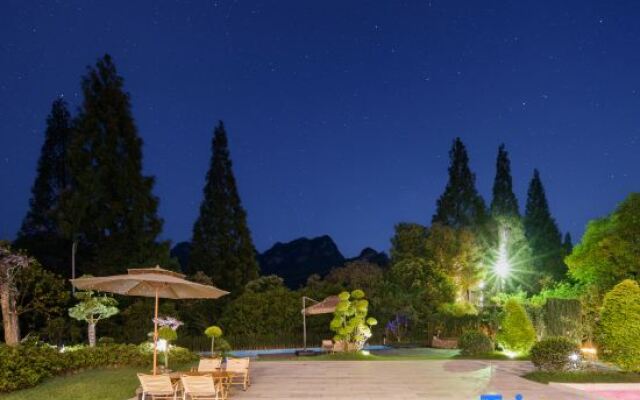 Xinchang Huaqianyueshang Homestay (Nineteen Peaks)