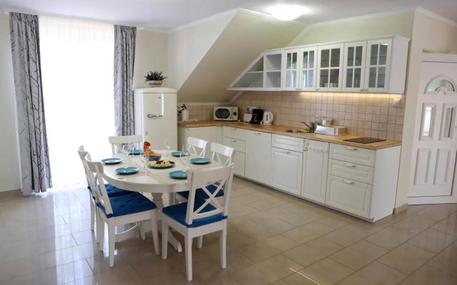 Rév Apartman