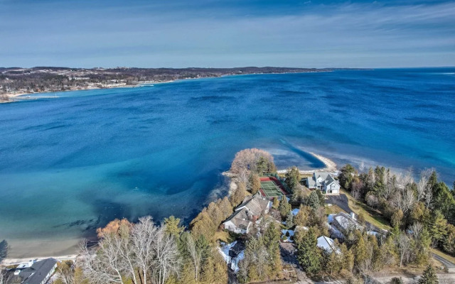 Tennis Court & 500' of Waterfront: Suttons Bay Gem