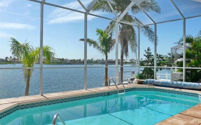 Waterfront Home With Views, Pool and Walk to Beach