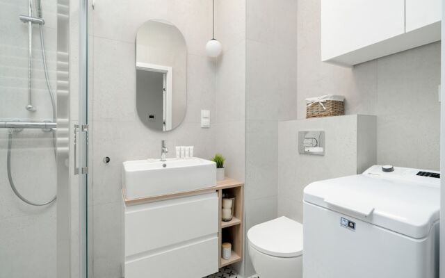 Minimalist Studios in Poznań by Renters