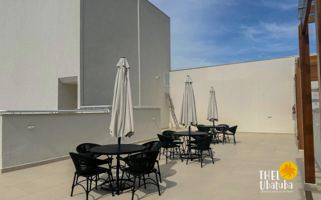 Apto completo e confortável com roupa de cama nas Toninhas  Condomínio Lumière