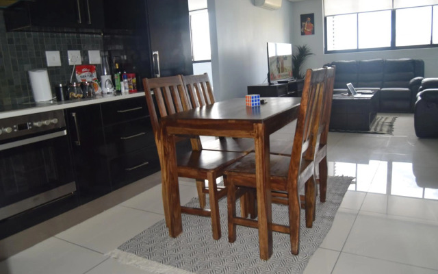 Highrise Windhoek apartment with skyline view, pool and gym