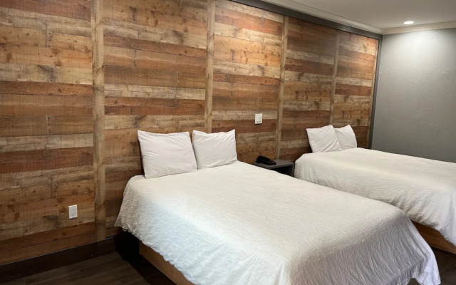 Symphony Inn and Suites