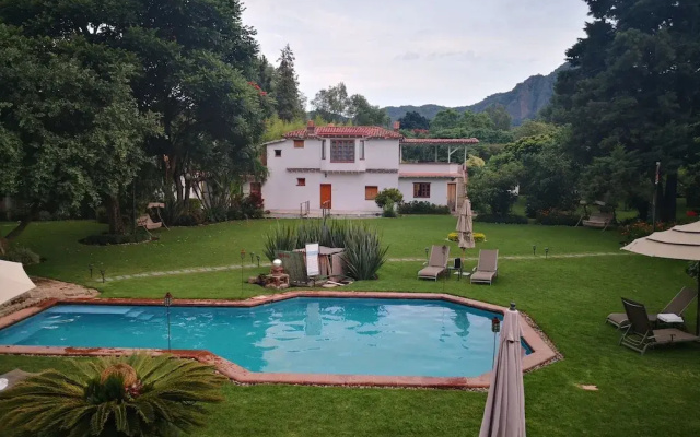 Casa Flor de Mayo