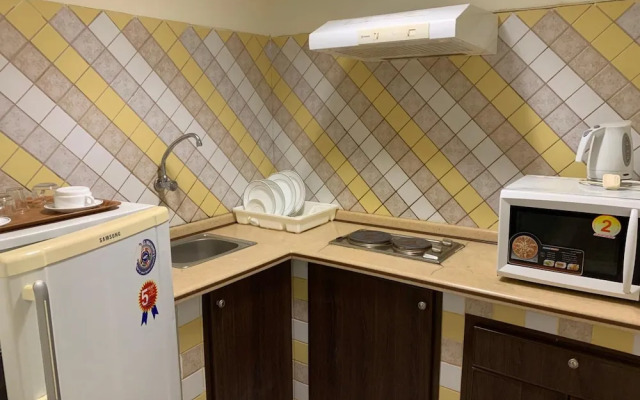 Delmon Hotel Suites