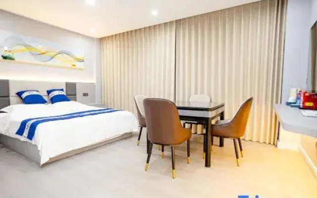 Zhumadian Huaqing Business Hotel