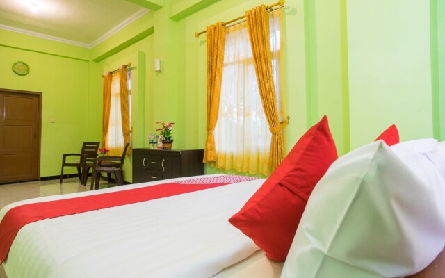 Rhona Guest House Syariah by OYO Rooms
