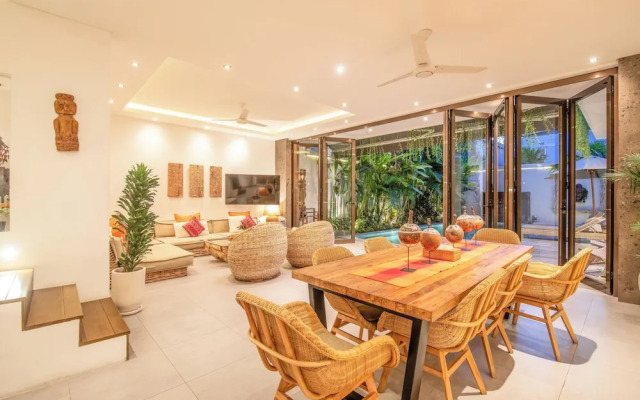 Luxury 4BR Haven, Steps to Canggu's Beach Elegance