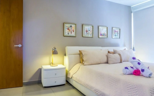 Lunada 314 Modern Playa del Carmen Condo with Tropical Garden View by RedAwning