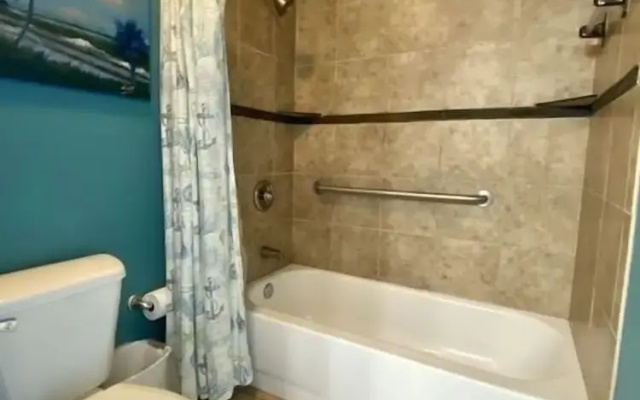 Wonderful Tropical Condo with Beach and Fitness Center Access - Unit 0102 by RedAwning