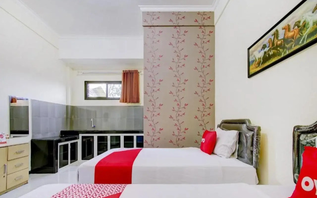 Capital O 90151 Guest House 180