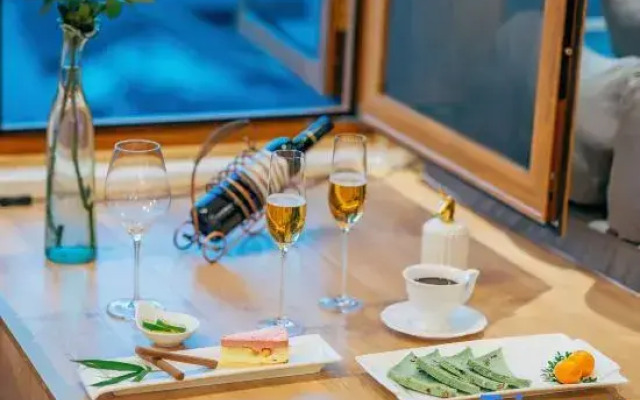 Lijiang Zhenmei Shishan Scenic Inn (Sifang Street Big Water Wheel Store)