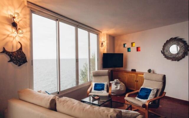 Canary casita next to the Atlantic Ocean