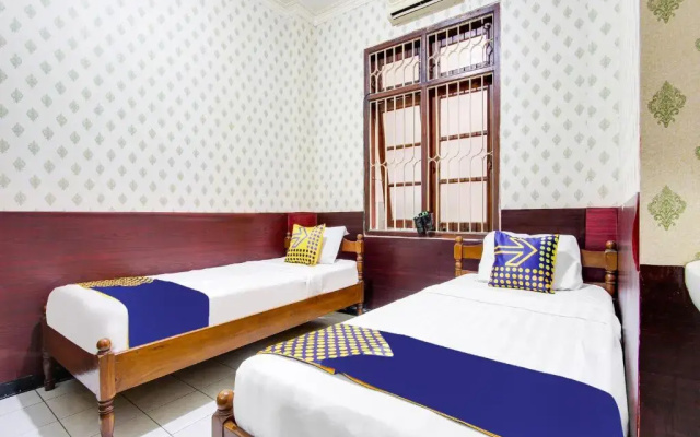 SPOT ON 91908 Hotel Wigati