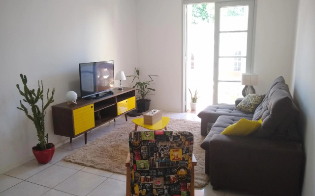 Quarto aconchegante em Apê, no Calçadão