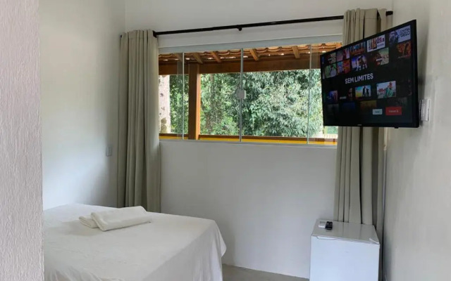 Apartamento com cachoeira no quintal