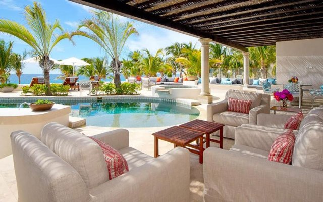 Spectacular 3-Story Beachfront Villa with a Huge Pool Patio