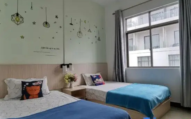 Xiyangyang Yunnan Renjia Homestay (Weizhou Island Landmark Plaza)