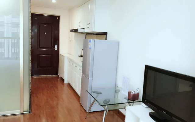 Xingyue Apartment Luogang Wanda