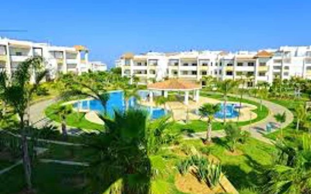Apartment with One Bedroom in Assilah, with Wonderful Sea View, Pool Access And Furnished Garden - 100 M From the Beach
