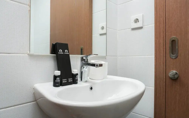 Modern 1BR Apartment at Puri Orchard