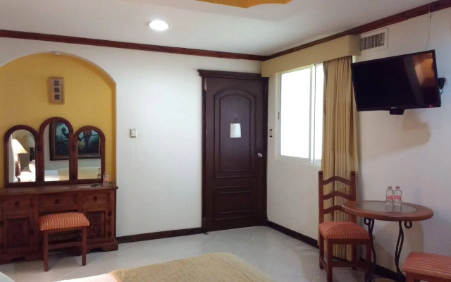 Hotel Suites Flamboyanes