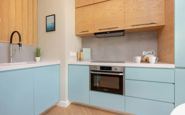 Bright Blue Apartment by Renters