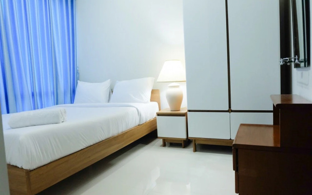 Homey and Modern 2BR Puri Mansion Apartment