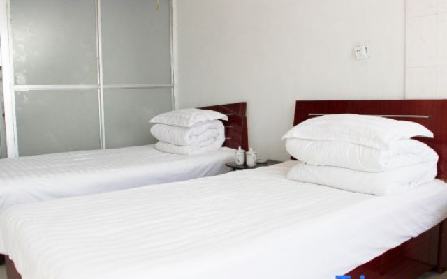Minquan Jixiang Hotel