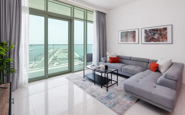 Elegant 2BR Emaar Beachfront Retreat