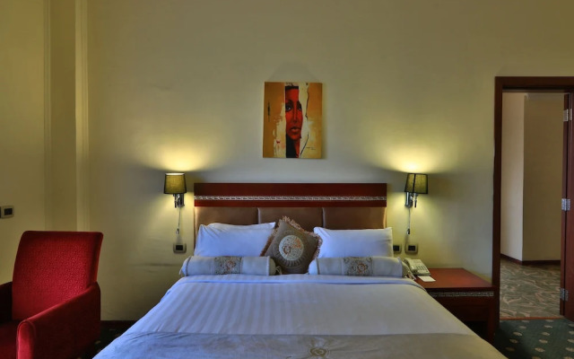 Kenenisa.. Oasis International Hotel